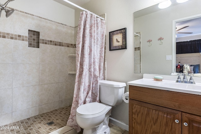 bathroom with vanity, a shower with curtain, and toilet