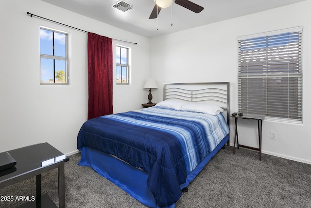 11959 W Vernon Ave, Avondale, AZ 85392 - bedroom featuring baseboards, carpet floors, visible vents, and a ceiling fan