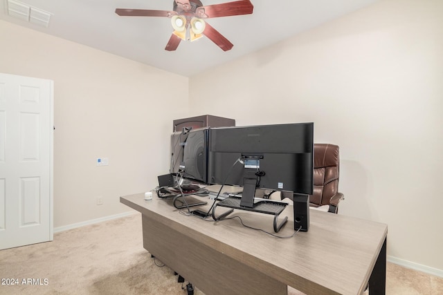 office featuring light carpet and ceiling fan