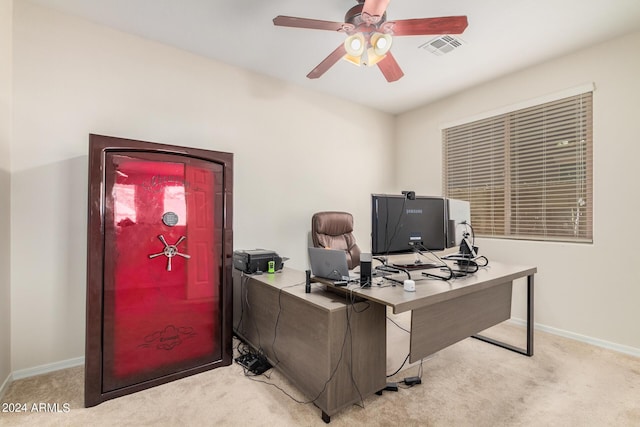 home office featuring light colored carpet and ceiling fan