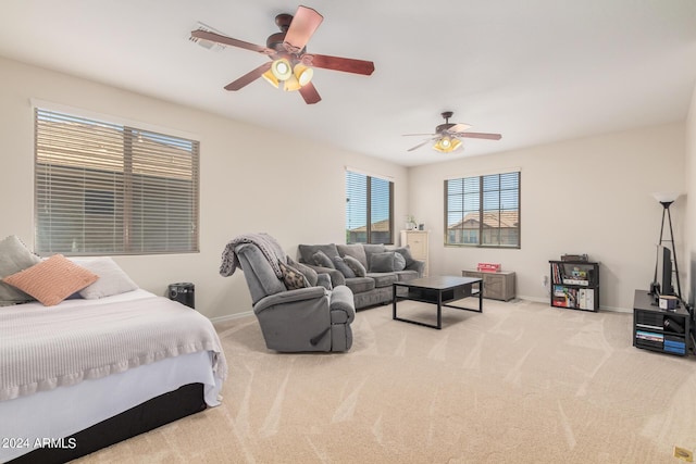 carpeted bedroom featuring ceiling fan