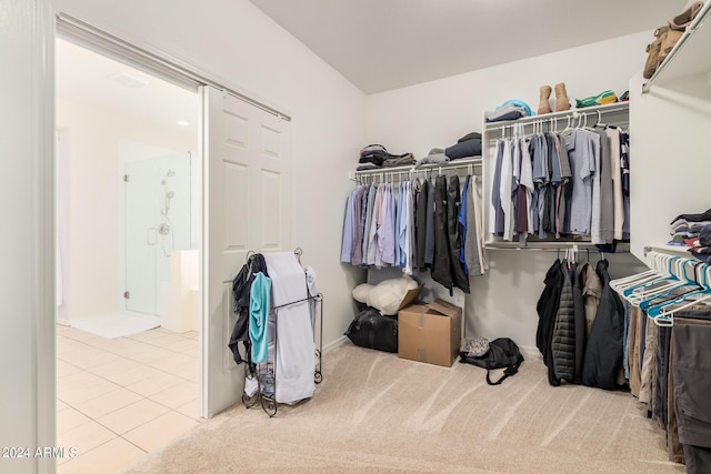 spacious closet featuring tile patterned floors