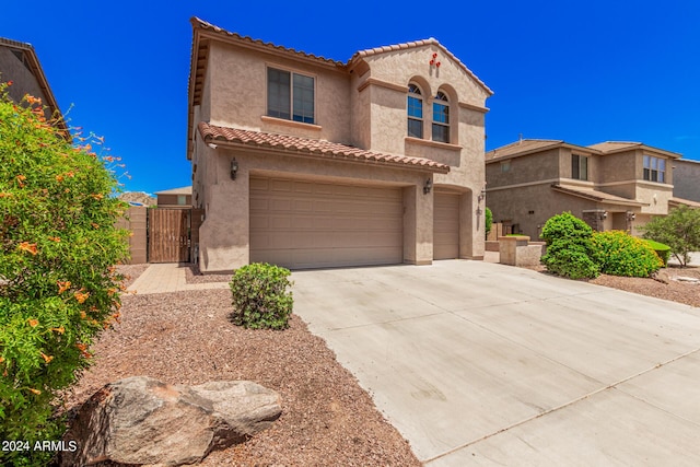 view of front of property featuring a garage