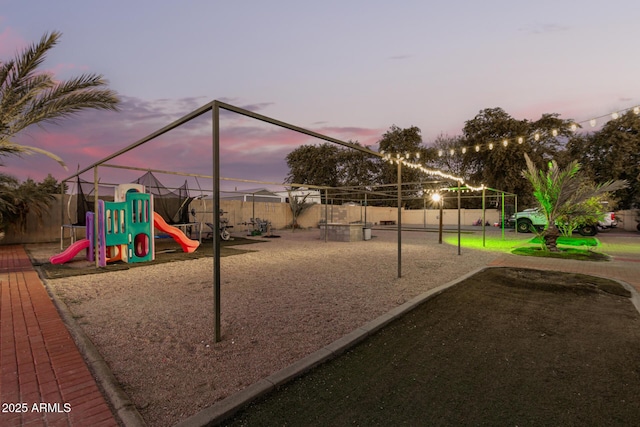 view of playground at dusk