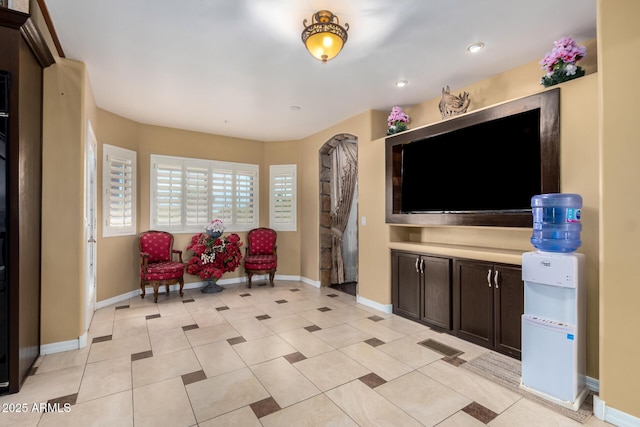 living room featuring light tile patterned floors