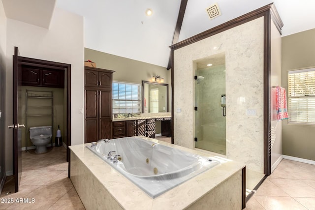 full bathroom featuring vanity, beam ceiling, separate shower and tub, and tile patterned floors