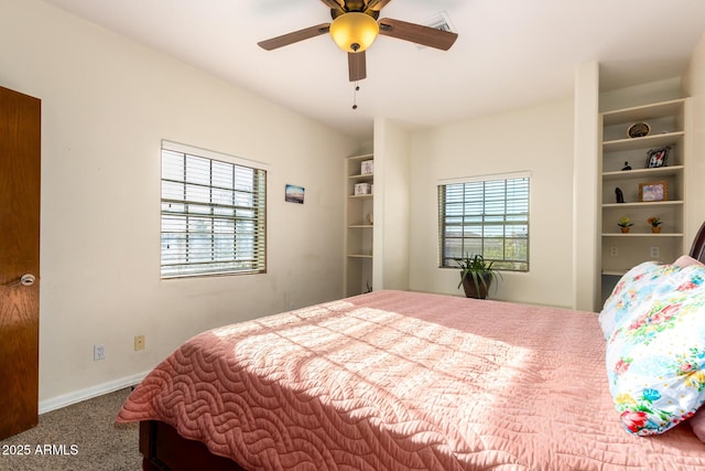 bedroom with ceiling fan and carpet floors