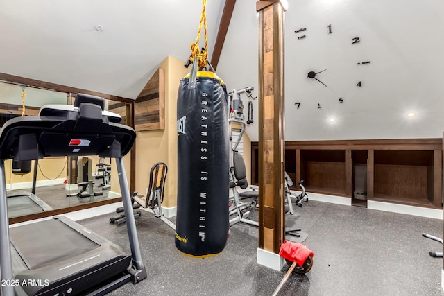 exercise area with vaulted ceiling