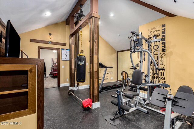 workout area featuring vaulted ceiling