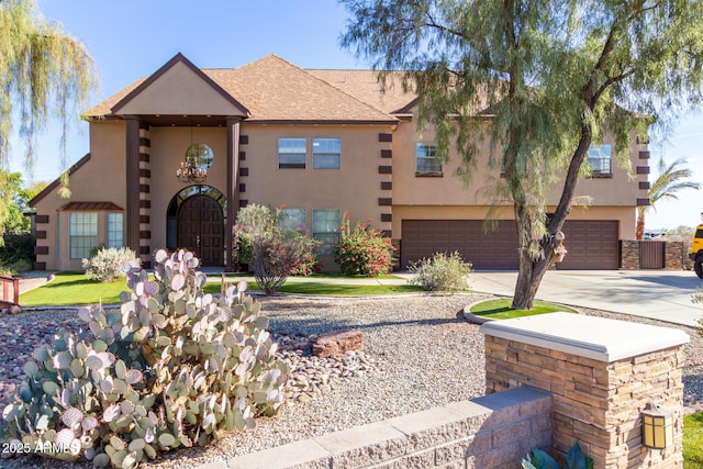 view of front of home with a garage