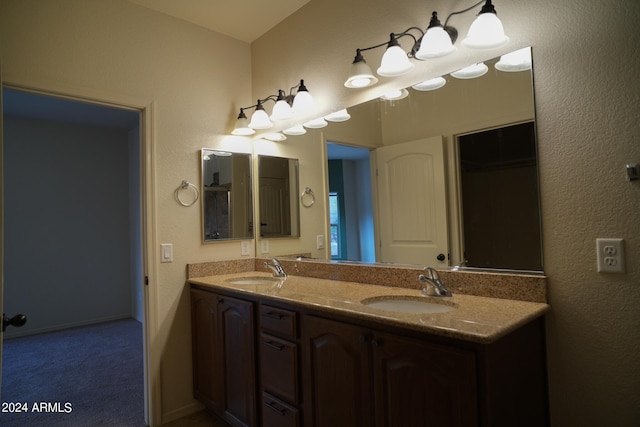 bathroom featuring double vanity