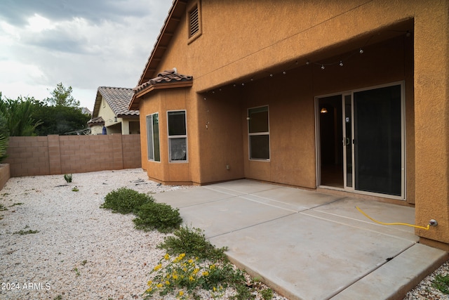 back of house featuring a patio area