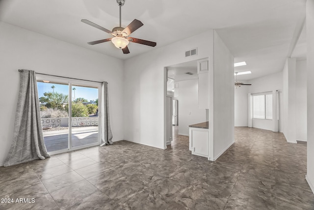 unfurnished room featuring ceiling fan