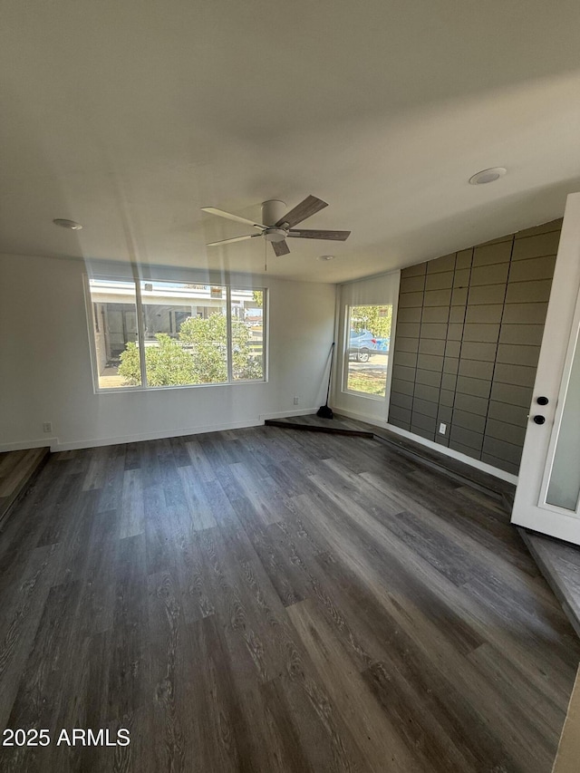 3824 W Puget Ave, Phoenix, AZ 85051 - spare room featuring dark wood-type flooring and a ceiling fan