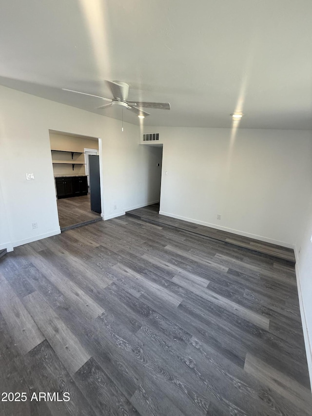 3824 W Puget Ave, Phoenix, AZ 85051 - empty room featuring dark wood-style flooring and a ceiling fan