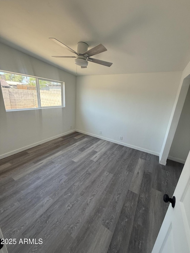 3824 W Puget Ave, Phoenix, AZ 85051 - empty room featuring dark wood finished floors and a ceiling fan