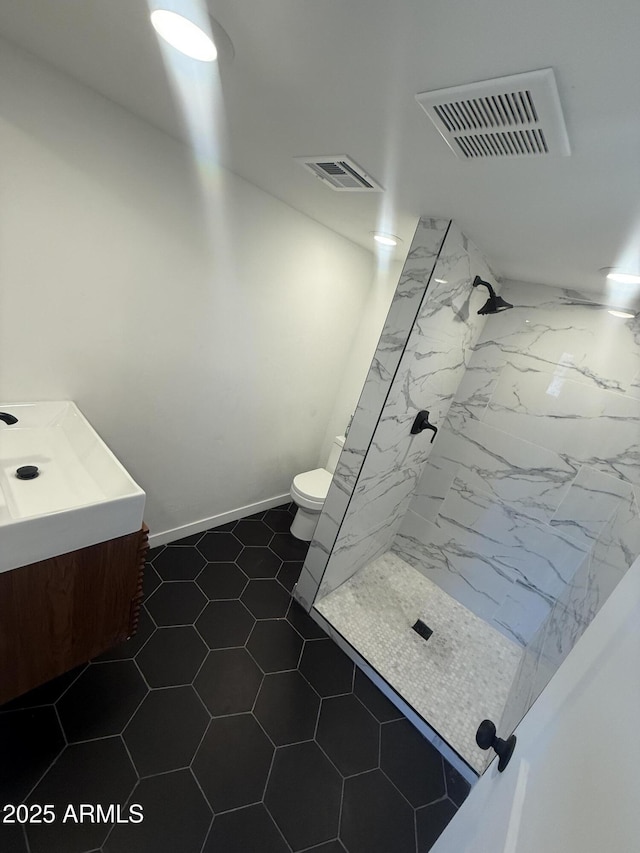 3824 W Puget Ave, Phoenix, AZ 85051 - bathroom featuring vanity and a marble finish shower