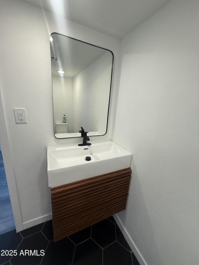 3824 W Puget Ave, Phoenix, AZ 85051 - bathroom featuring vanity and tile patterned flooring