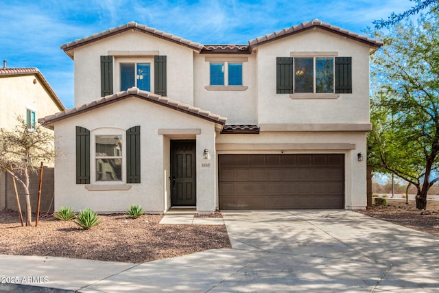 mediterranean / spanish-style home featuring a garage