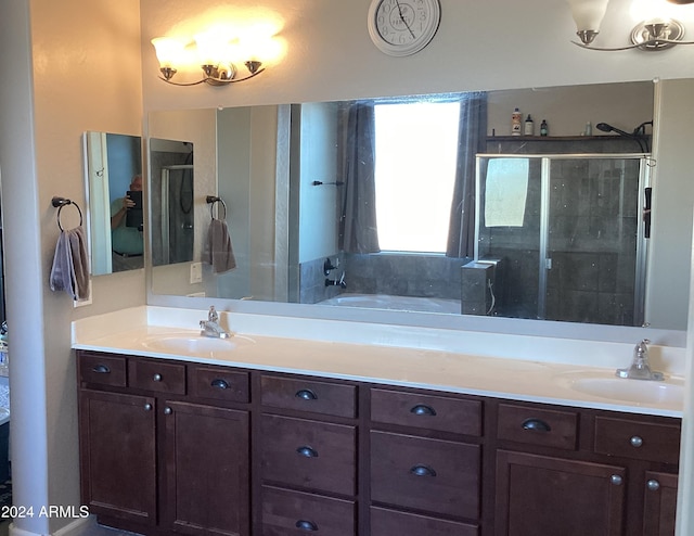 bathroom with plus walk in shower and vanity