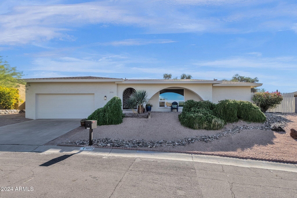 ranch-style house with a garage