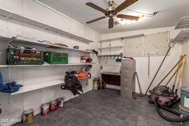 storage area featuring visible vents and a ceiling fan