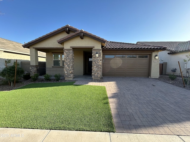 view of front of house featuring stucco siding, a front lawn, a garage, stone siding, and decorative driveway