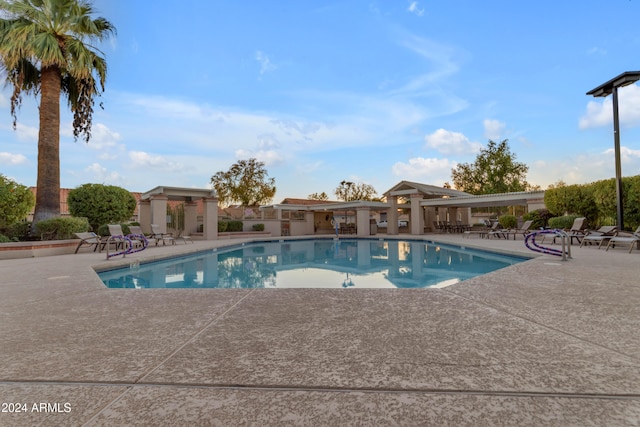 view of swimming pool featuring a patio