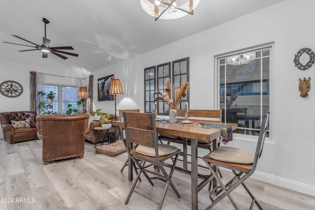 dining space with ceiling fan and light hardwood / wood-style floors