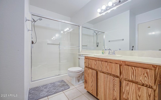 2505 E Desert Cactus St, Phoenix, AZ 85032 - full bathroom with vanity, a shower stall, tile patterned flooring, and toilet