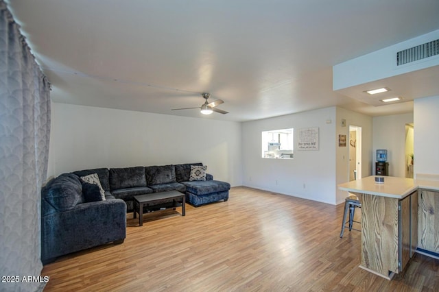 2505 E Desert Cactus St, Phoenix, AZ 85032 - living area featuring wood finished floors and a ceiling fan