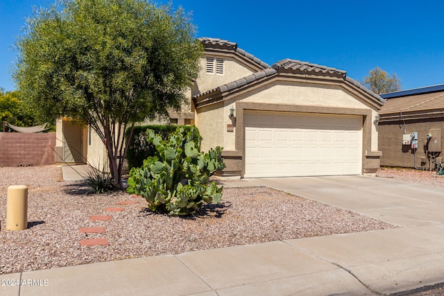 view of front of house with a garage