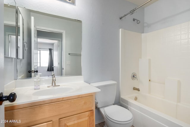 full bathroom featuring shower / bathing tub combination, vanity, and toilet