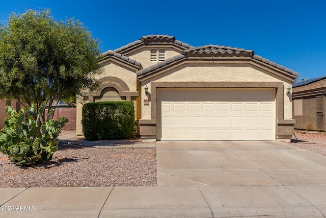 view of front of home featuring a garage