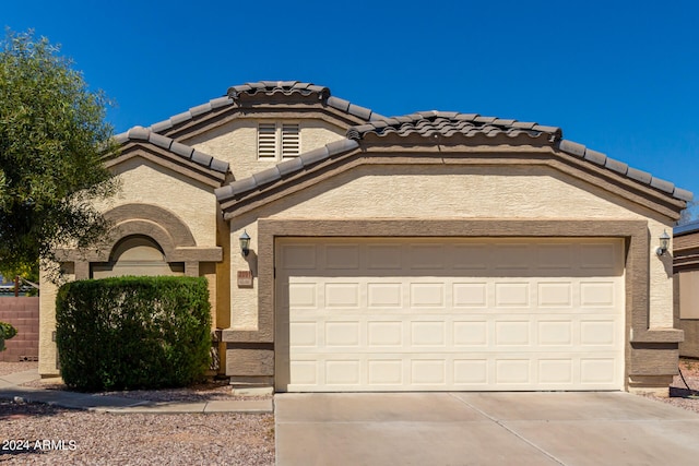 view of front of home featuring a garage