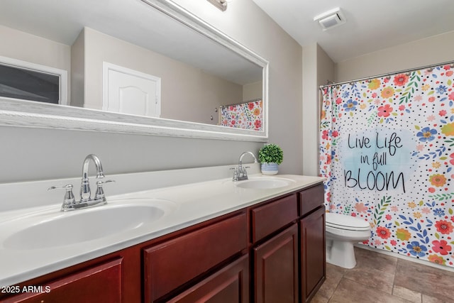 full bath with toilet, double vanity, tile patterned flooring, and a shower with shower curtain