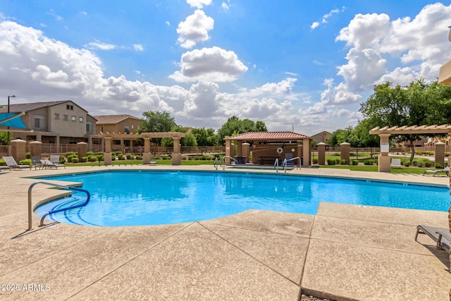 community pool with a pergola, fence, a patio area, and a gazebo