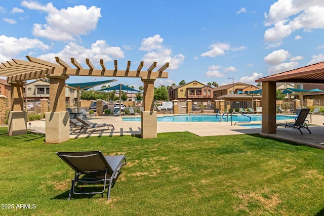 community pool featuring a pergola, a yard, and a patio area