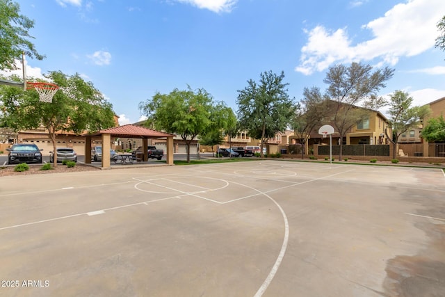 view of sport court featuring community basketball court, a gazebo, and fence