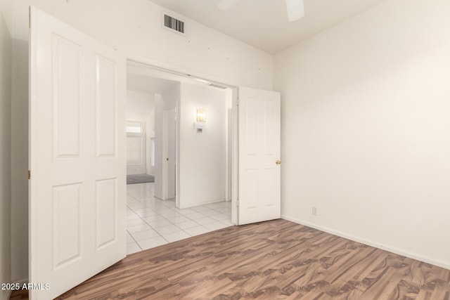 20435 N 39th Dr, Glendale, AZ 85308 - empty room featuring baseboards, visible vents, ceiling fan, and light wood-style flooring