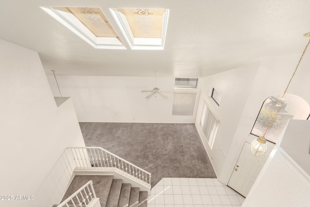 20435 N 39th Dr, Glendale, AZ 85308 - hallway featuring a skylight, carpet floors, and stairway