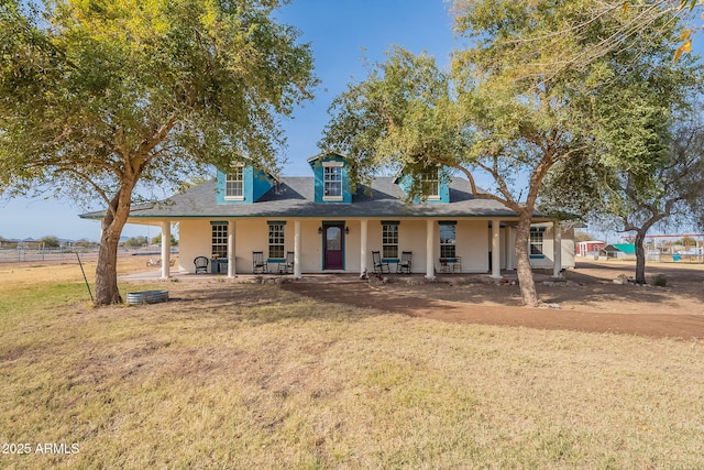 view of front of property with a front yard