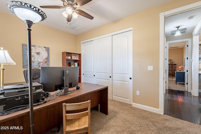 office featuring ceiling fan and carpet flooring