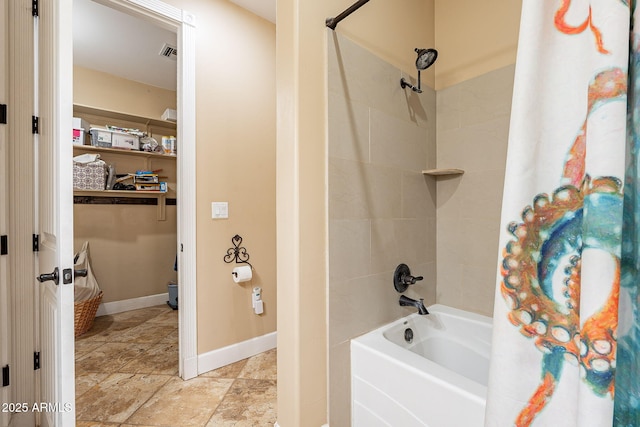 bathroom featuring shower / tub combo with curtain