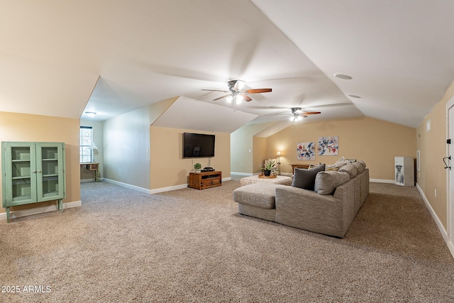 carpeted living room with lofted ceiling and ceiling fan