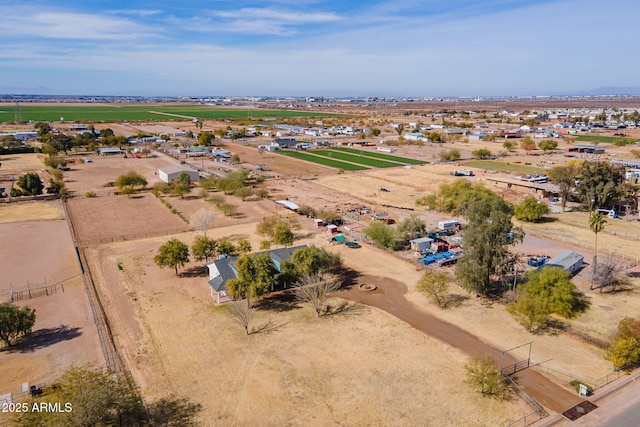 birds eye view of property featuring a rural view