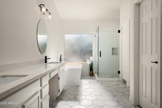 16238 N 58th St, Scottsdale, AZ 85254 - bathroom with a freestanding bath, double vanity, a shower stall, and tile patterned floors