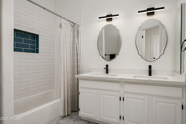 16238 N 58th St, Scottsdale, AZ 85254 - full bathroom with marble finish floors, double vanity, and shower / bath combo