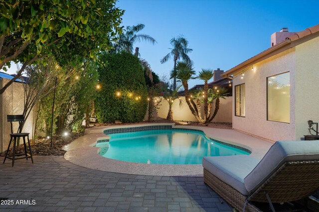 16238 N 58th St, Scottsdale, AZ 85254 - view of pool featuring a patio and a fenced backyard
