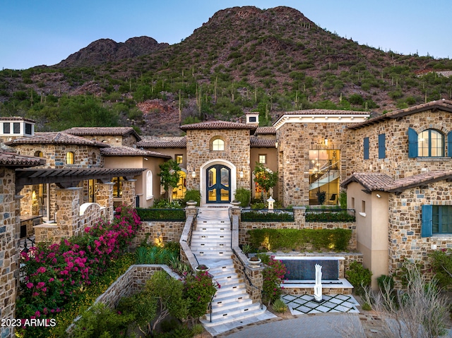 view of front of property with a mountain view